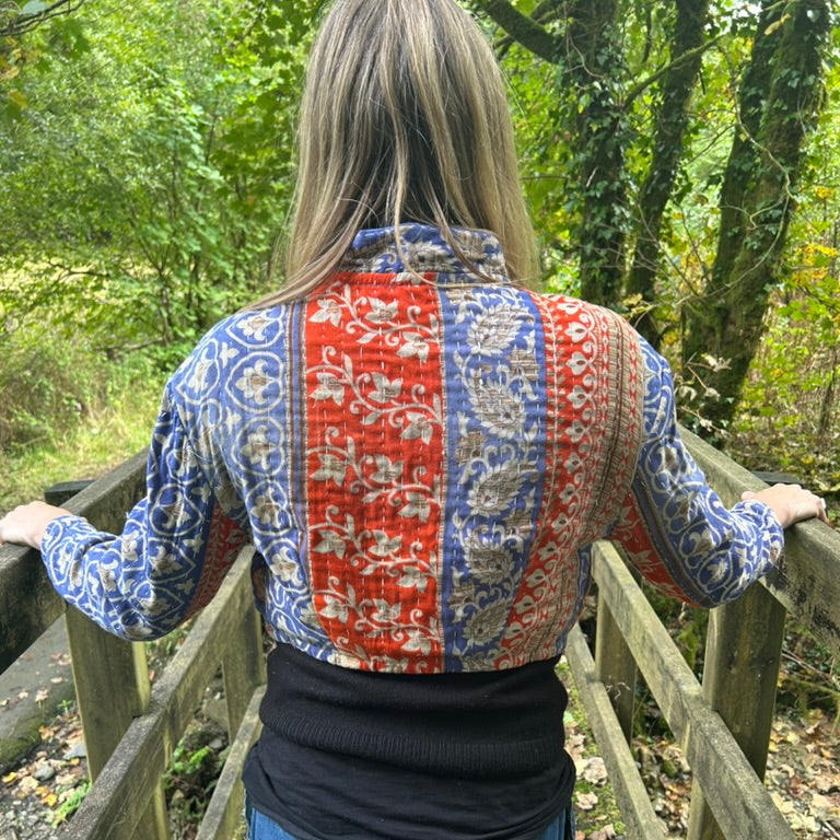 Back view of Saffron Sky Gudri Jacket in red, cobalt blue and cream reclaimed cotton with kantha stitching